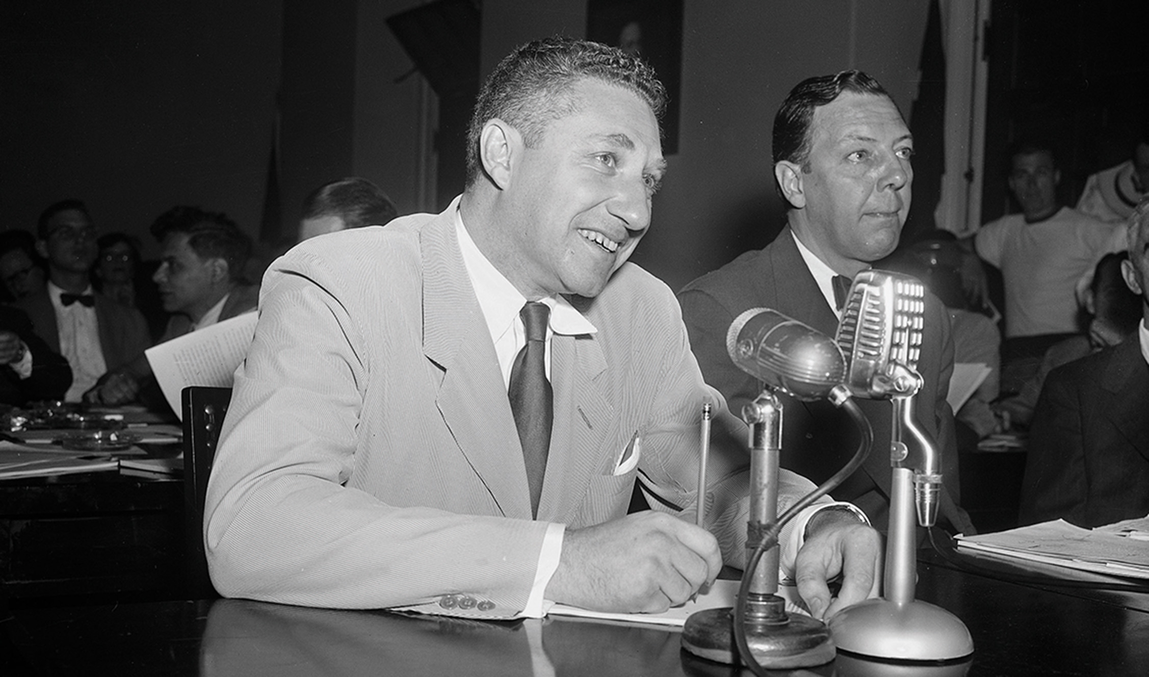 Man speaking into microphone