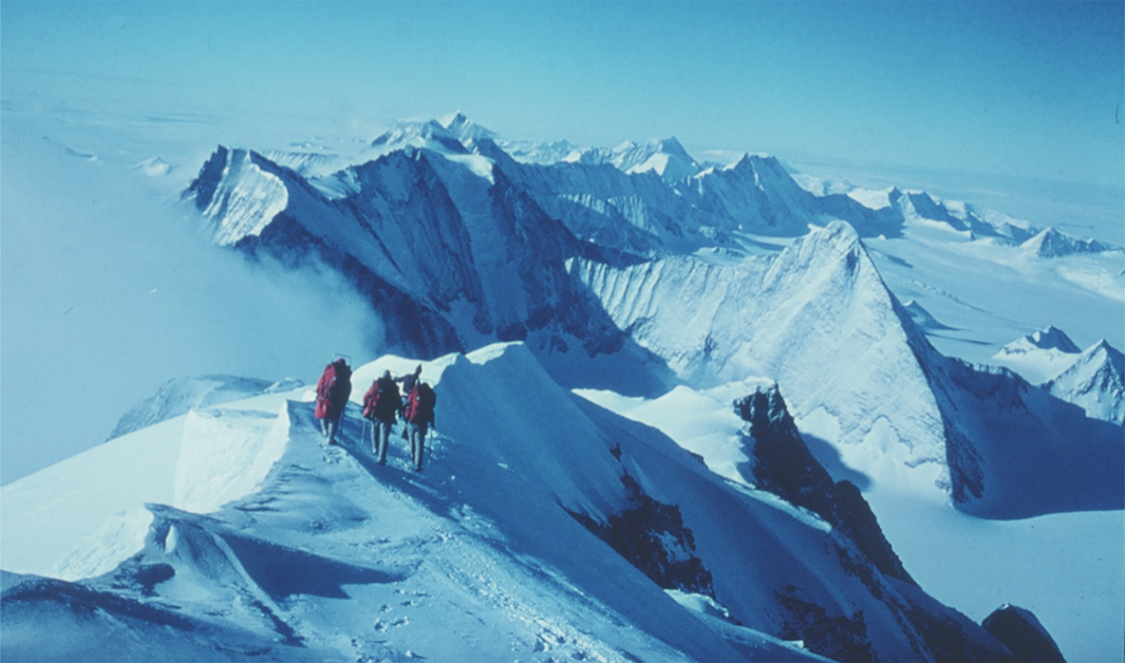 Hiking on snowy mountain