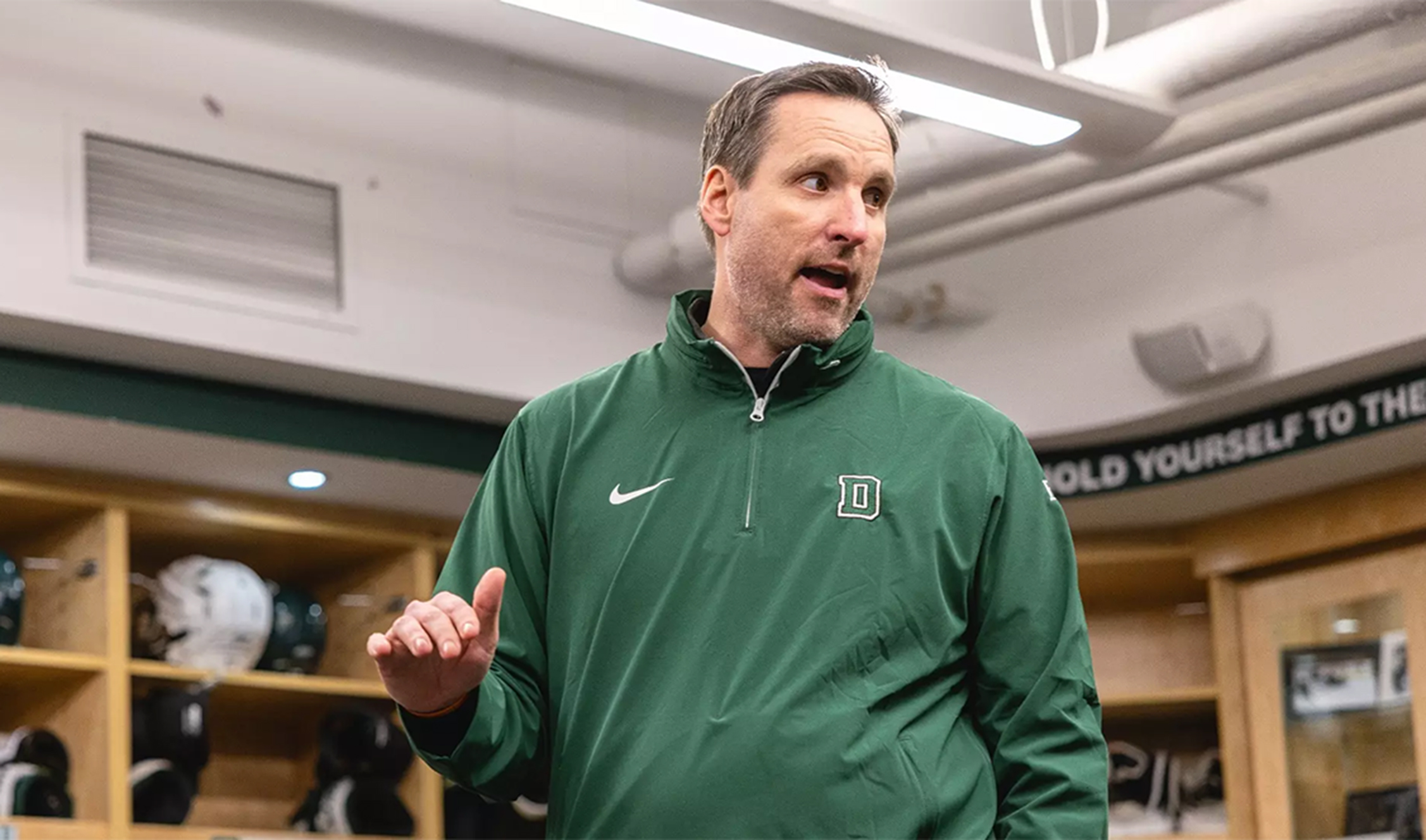 Coach talking in locker room