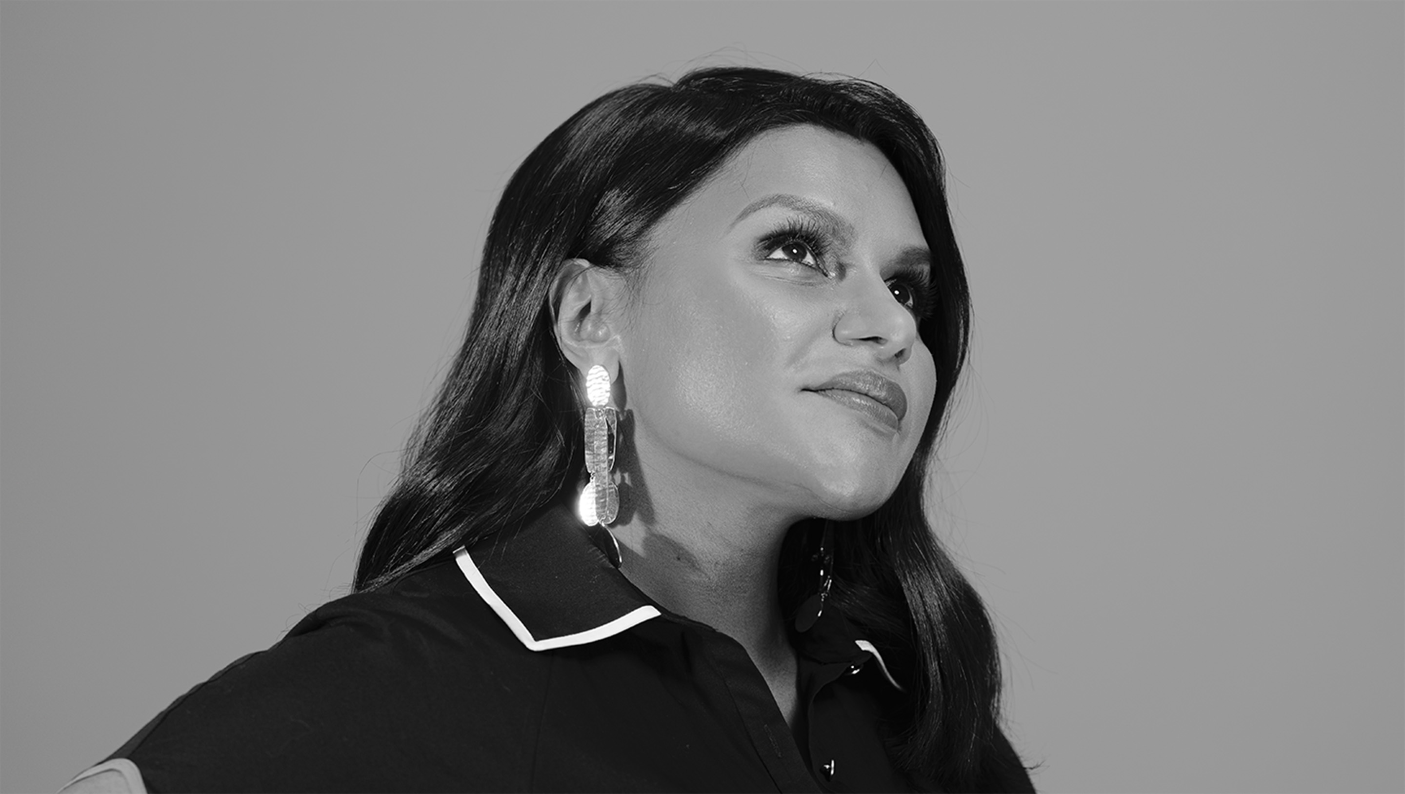 Headshot of woman wearing earrings
