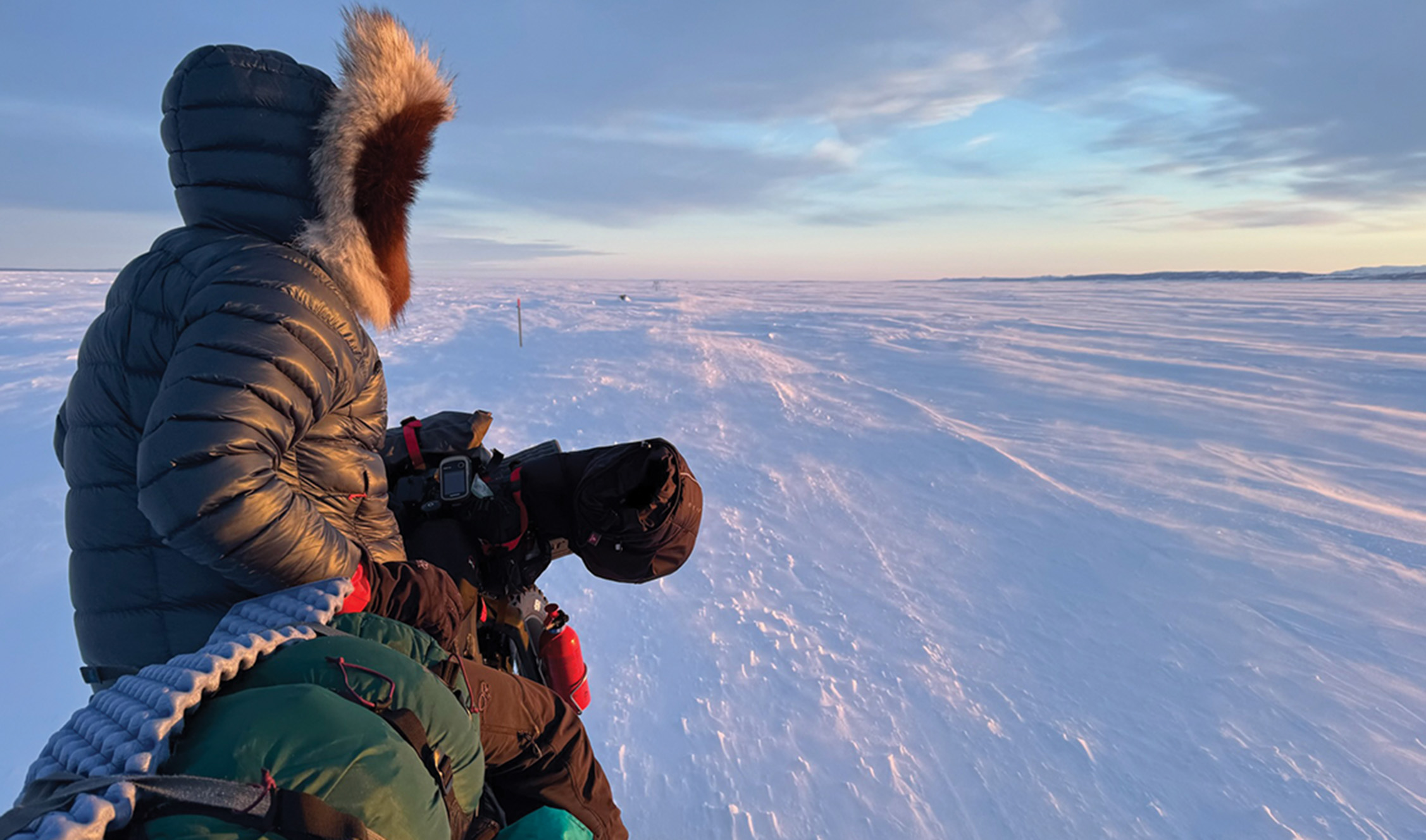 Person sitting in snow