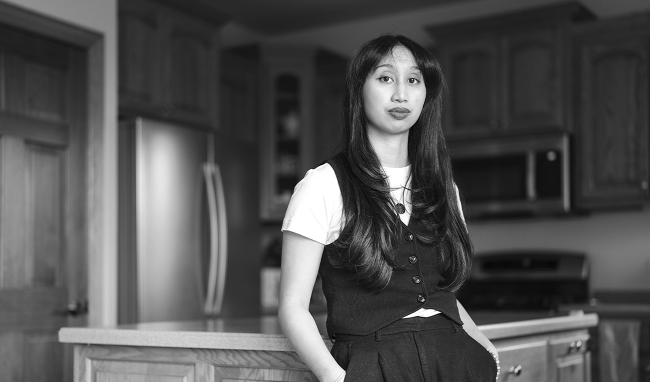 Woman standing in kitchen