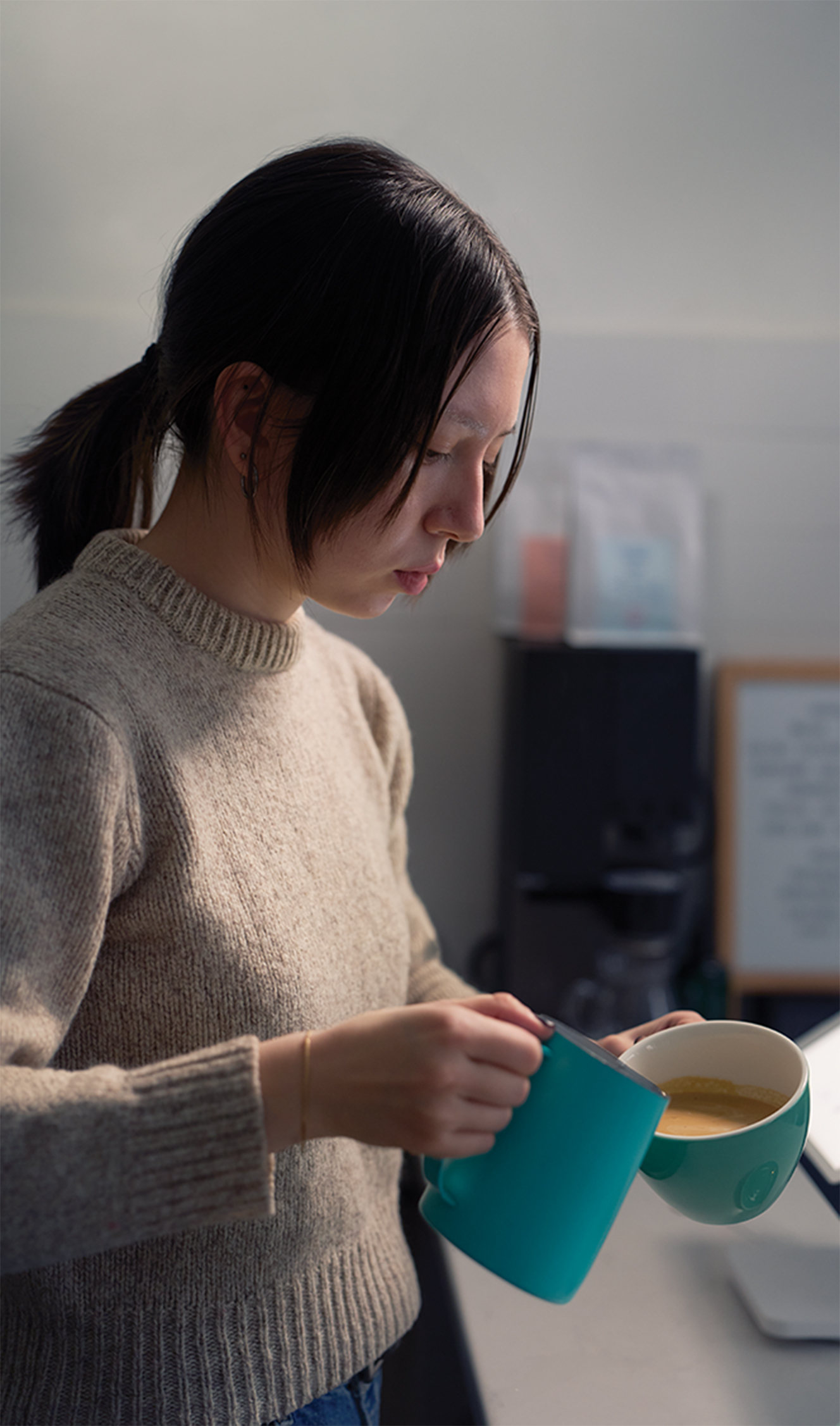 Woman pouring coffee