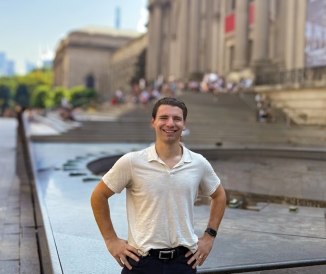 Man standing in front of building