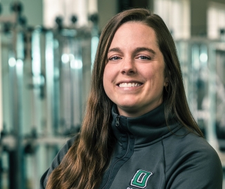 Headhsot of woman in fitness center