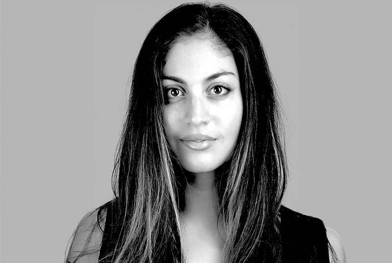 Black and white headshot of woman