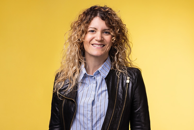 Woman wearing collard shirt and blazer