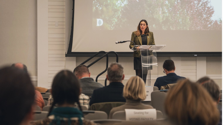 Person speaking to audience