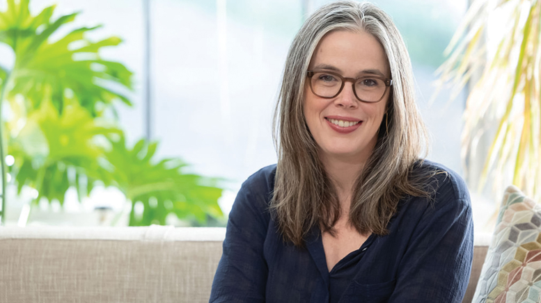 Woman sitting on couch