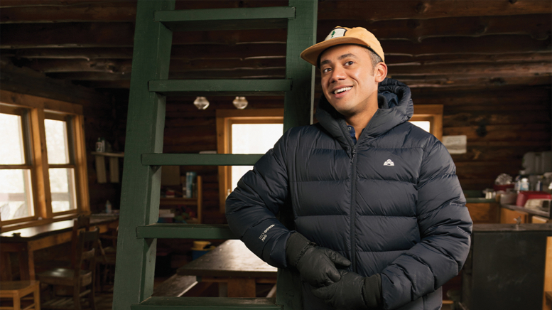 Man leaning against ladder