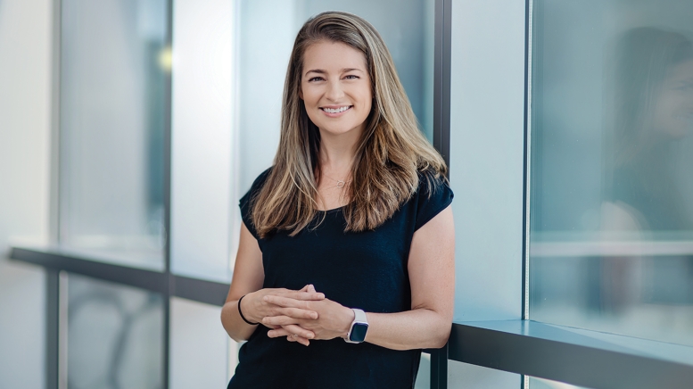 Woman with hands clasped