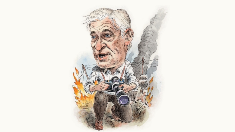 Illustration of man holding a camera, kneeling on ground with snow and flames in background