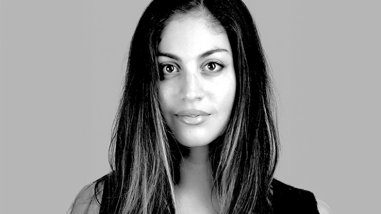 Black and white headshot of woman