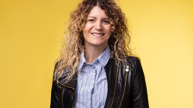 Woman wearing collard shirt and blazer