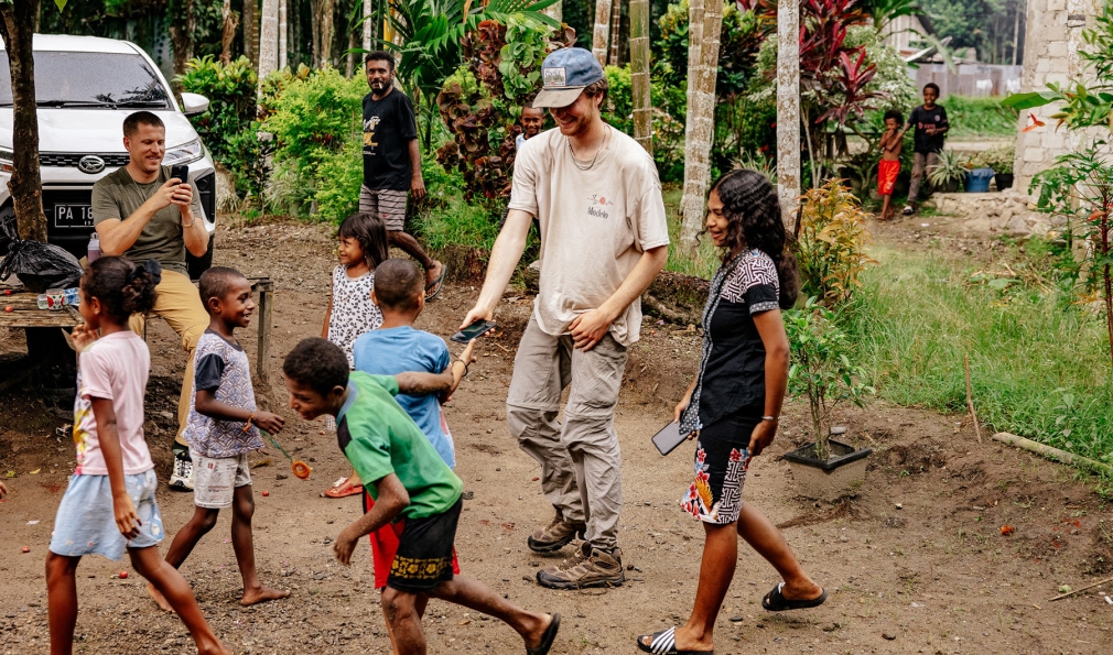 Children meeting with a man