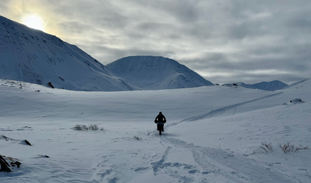 Person biking on snow