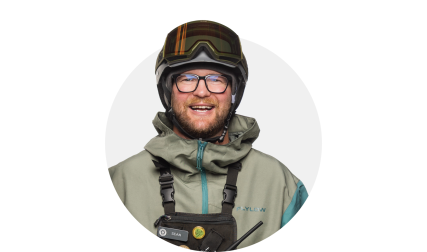 Man wearing ski goggles on head