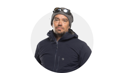 Man wearing beanie, sunglasses on forehead
