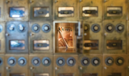 Person looking out of mailbox