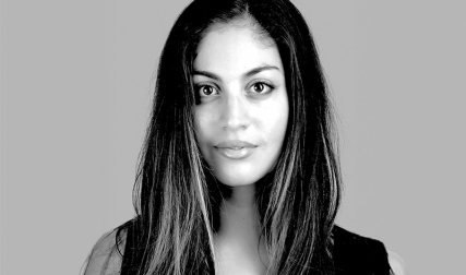 Black and white headshot of woman