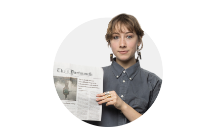 woman holding newspaper