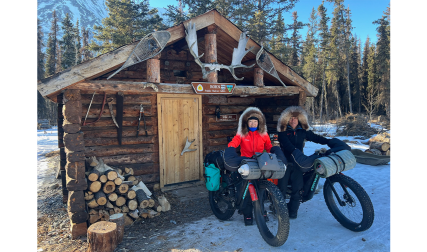 Two people on fat bikes in winter