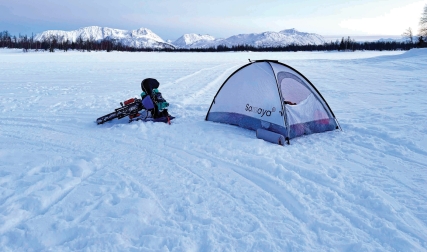 Tent, bike in snow